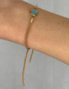 BLUE CHALCEDONY GEMSTONE BEZEL BRACELET WITH TAN CORD - Hadobody