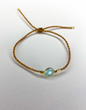 BLUE CHALCEDONY GEMSTONE BEZEL BRACELET WITH TAN CORD - Hadobody